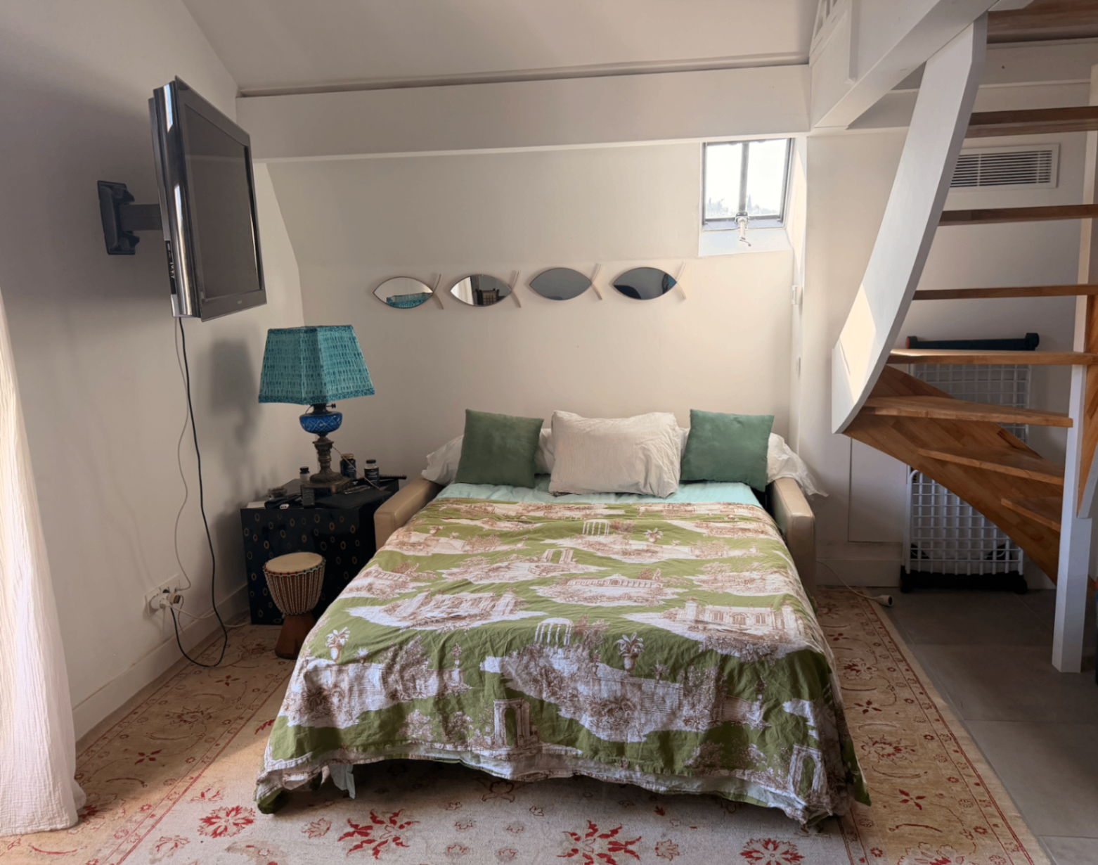 Front view of the daybed beneath the skylight and loft